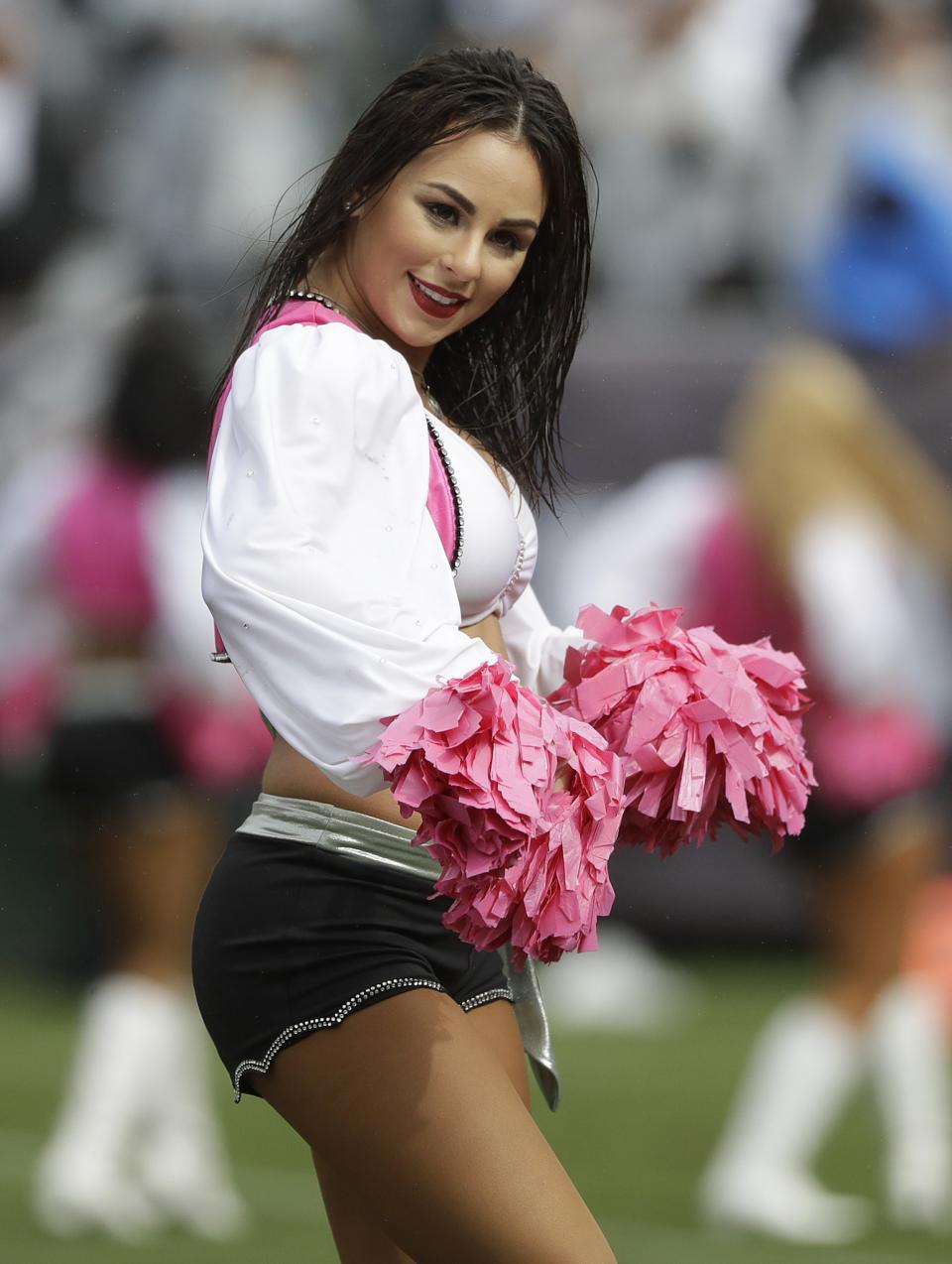 <p>Oakland Raiders cheerleaders perform during the first half of an NFL football game between the Oakland Raiders and the Kansas City Chiefs in Oakland, Calif., Sunday, Oct. 16, 2016. (AP Photo/Marcio Jose Sanchez) </p>