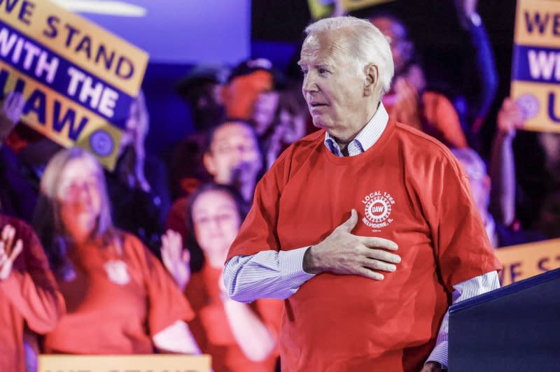 President Joe Biden praised the work of unions as he joined UAW President Shawn Fain and Illinois Gov. J.B. Pritzker Thursday to mark the re-opening of the Belvidere, Ill., auto plant and the recent UAW contract that won historic gains for auto workers. Photo by Tannen Maury/UPI