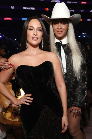 <p>Kevin Mazur/Getty</p> Beyoncé and Kacey Musgraves