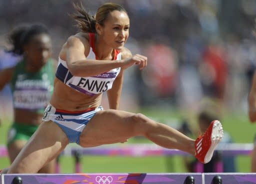 Britain's Jessica Ennis during the women's heptathlon 100m hurdles heats at the London Olympics on August 3. She aught the crowd's attention with a dazzling start as she blazed through the first four events to lead the competition