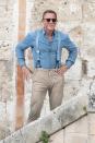 Daniel Craig gets rough around the edges on Tuesday while filming the new Bond movie,<em> No Time to Die,</em> in Matera, Italy.