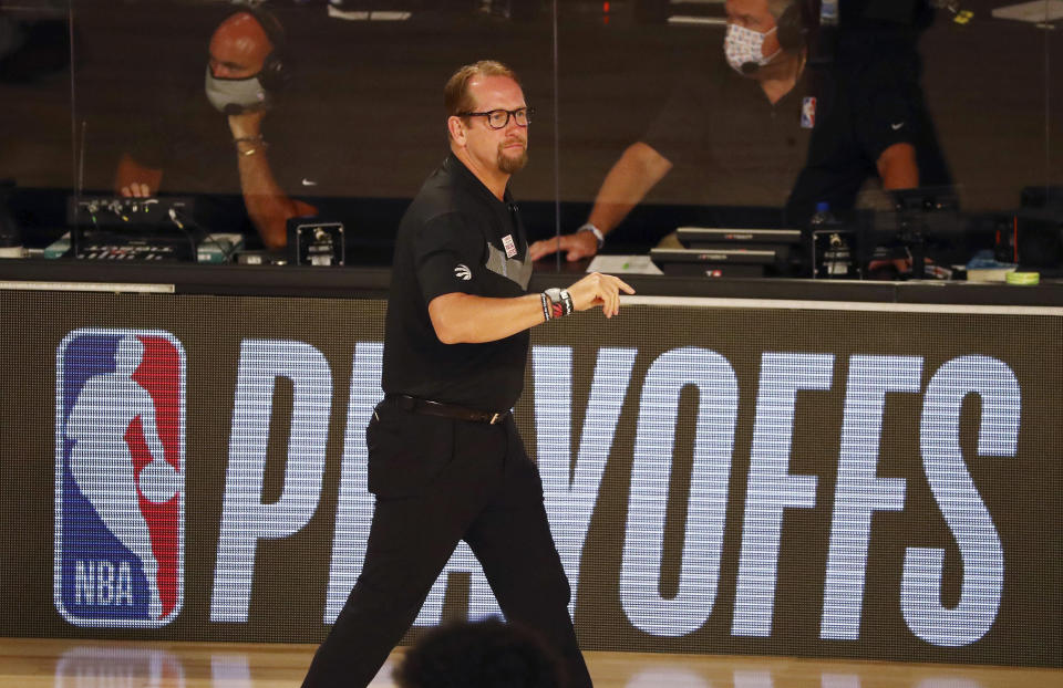 Toronto Raptors head coach Nick Nurse watches game action against the Brooklyn Nets during the first half of Game 4 of an NBA basketball first-round playoff series, Sunday, Aug. 23, 2020, in Lake Buena Vista, Fla. (Kim Klement/Pool Photo via AP)