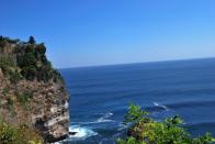 <b>Pura Uluwatu is one of Bali's most spectacular temples</b><br><br>Bali’s shrines are often located in the most exotic landscapes. This is Pura Uluwatu right atop the cliff. The scenery is breathtaking as you climb uphill through a small forested area patrolled by boisterous monkeys.