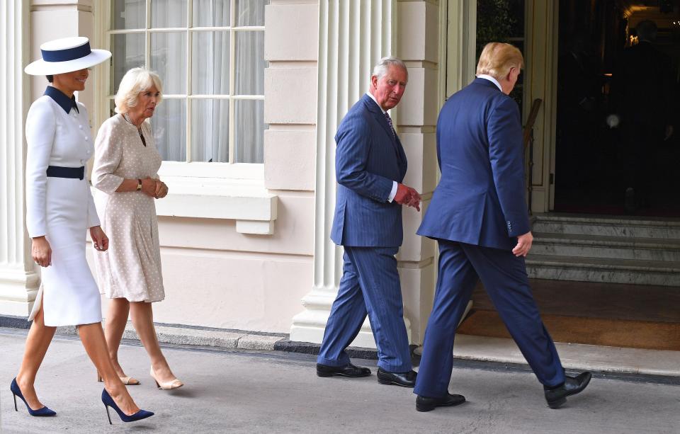 President Donald Trump and first lady Melania Trump walk with their hosts Prince Charles and his wife, Camilla, Duchess of Cornwall, into their London palace, Clarence House, on June 3, 2019, on the first day of the Trumps' three-day State Visit to the UK.
