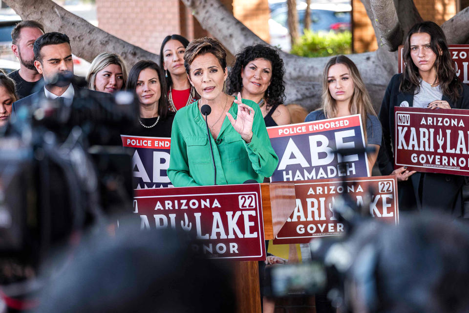 Republican nominee for governor Kari Lake holds a press conference in front of her campaign headquarters in Phoenix, on Oct. 27, 2022. - With less than two weeks to go before crucial US midterm elections, Republicans hope their narrative of a nation ravaged by inflation and crime will help them take back Congress and cripple the remaining two years of Joe Biden's presidency. (Olivier Touron / AFP - Getty Images)