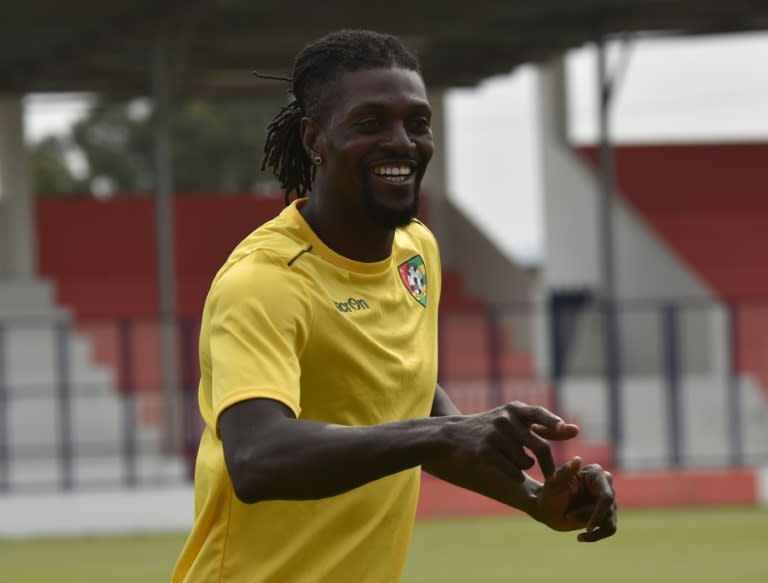 Togo's national football team player Emmanuel Adebayor (L) is pictured during a training session on January 18, 2017 in Btam, as part of the 2017 Africa Cup of Nations football tournament in Gabon