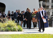 ST PETERSBURG, FL - OCTOBER 22: Pallbearers Austen Wheldon, Elliott Wheldon, Ashley Wheldon, Dario Franchitti, Scott Dixon and Tony Kanaan carry Dan Wheldon's casket to the hearse following a memorial service at First Presbyterian Church on October 22, 2011 in St Petersburg, Florida. Wheldon, who was 33 was killed in a 15-car crash at Sunday’s season-ending IndyCar race in Las Vegas. (Photo by Tim Boyles/Getty Images)