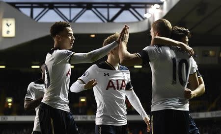 Britain Football Soccer - Tottenham Hotspur v Swansea City - Premier League - White Hart Lane - 3/12/16 Tottenham's Harry Kane celebrates scoring their third goal with team mates Reuters / Dylan Martinez Livepic