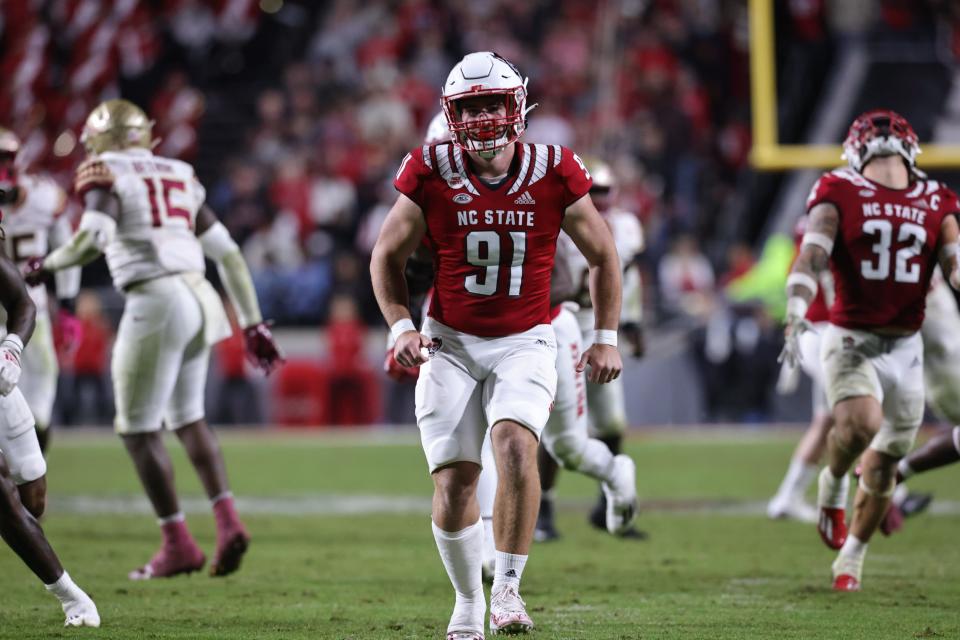 Joe Shimko playing football for N.C. State