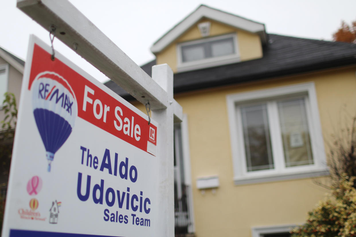 TORONTO, ON- A For Sale sign in front of an East York home in Toronto on Monday. Condo sales in the city inched the market up.(Rene Johnston/Toronto Star)        (Rene Johnston/Toronto Star via Getty Images)