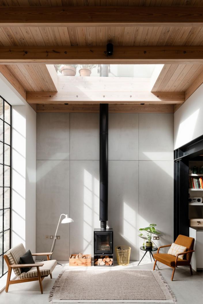 &#x201C;My husband&#x2019;s very keen on quite traditional wood furniture, and I quite like the juxtaposition of that with this modern, minimal space,&quot; says Leo.