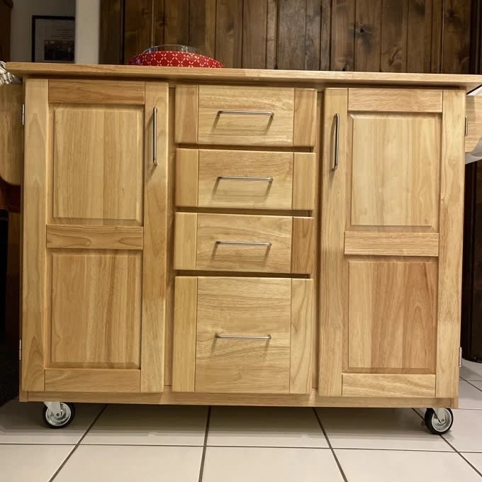 A brown kitchen island in a reviewer's home