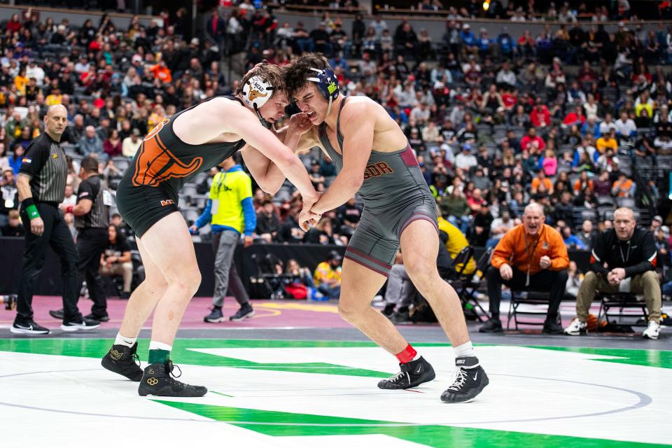 Windsor's Evan Perez battles with Mead's Dalton Berg during his semifinal match at the Colorado state wrestling tournament at Ball Arena in Denver on Friday.