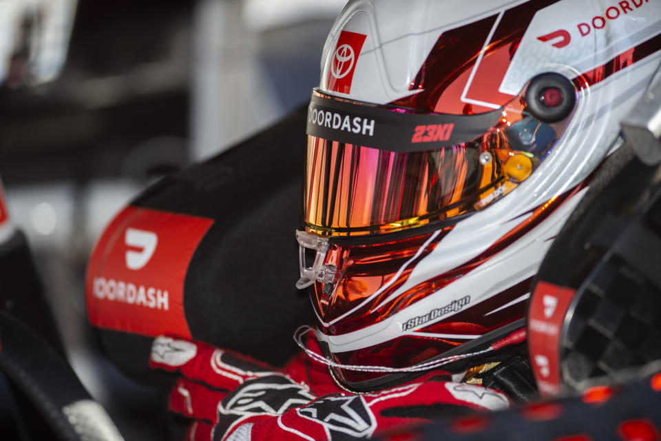 Driver Bubba Wallace in his car before qualifying for the NASCAR Cup Series auto race at Atlanta Motor Speedway on Saturday, March 18, 2023, in Hampton, Ga. (AP Photo/Hakim Wright Sr.)