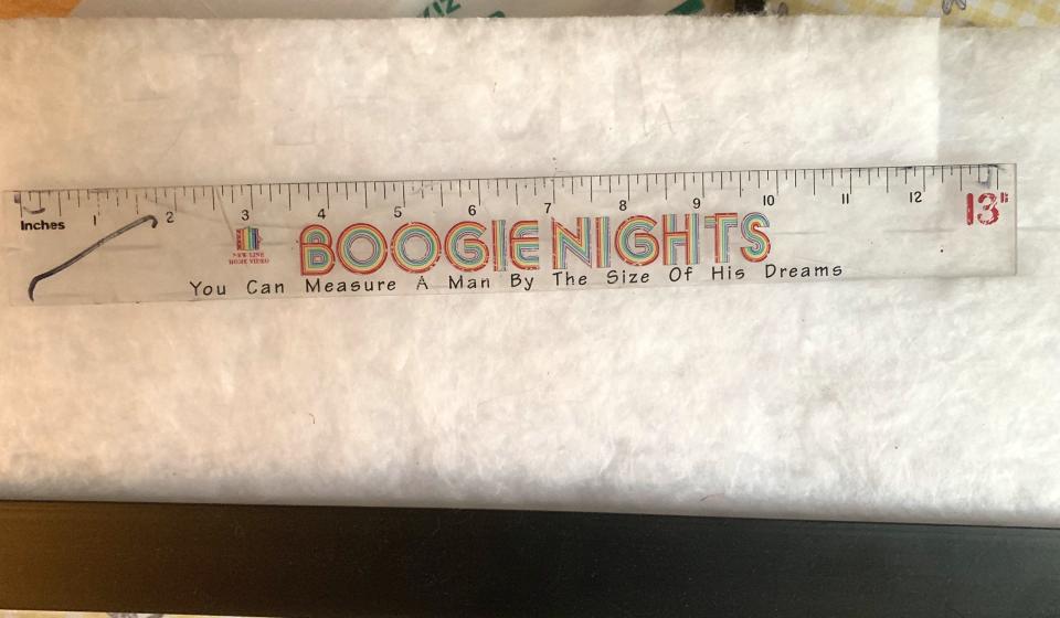 a clear ruler with the Boogie Nights logo