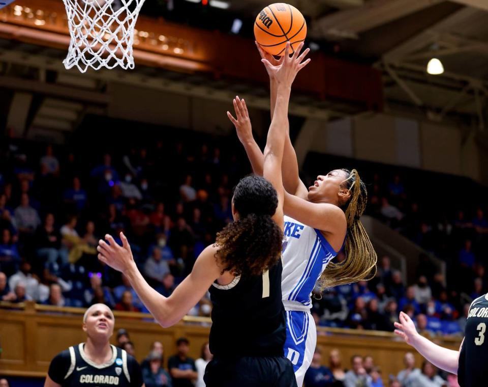 Duke’s Reigan Richardson drives to the basket past Colorado’s Tayanna Jones during the first half of an NCAA Tournament second round game at Cameron Indoor Stadium on Monday, March 20, 2023, in Durham, N.C.