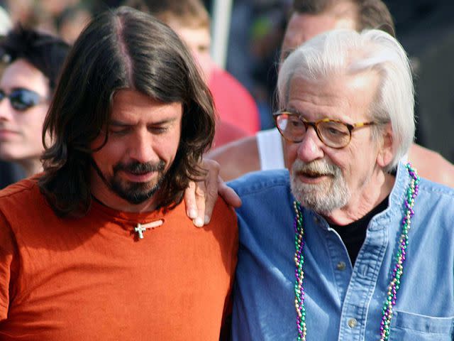 <p>Sipa/Shutterstock </p> Dave Grohl and his father James as Dave Grohl is presented with a key to the city of Warren, Ohio on August 2, 2009.
