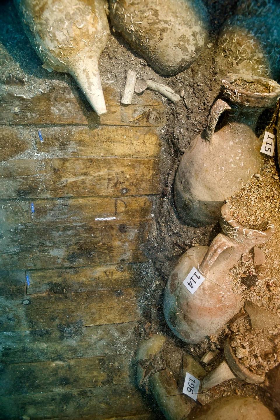 Some of the planks with the Roman numeral markings. Photo from the Catalan Archaeology Museum