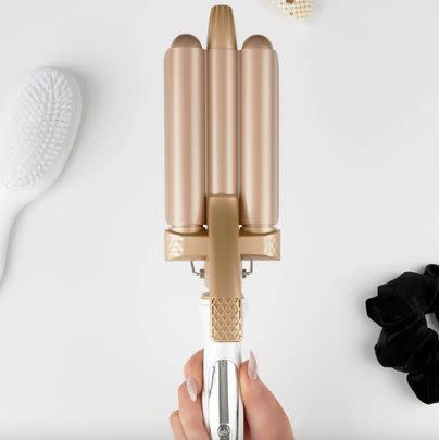 Let them live out their mermaid-hair dreams with this clever waving tool