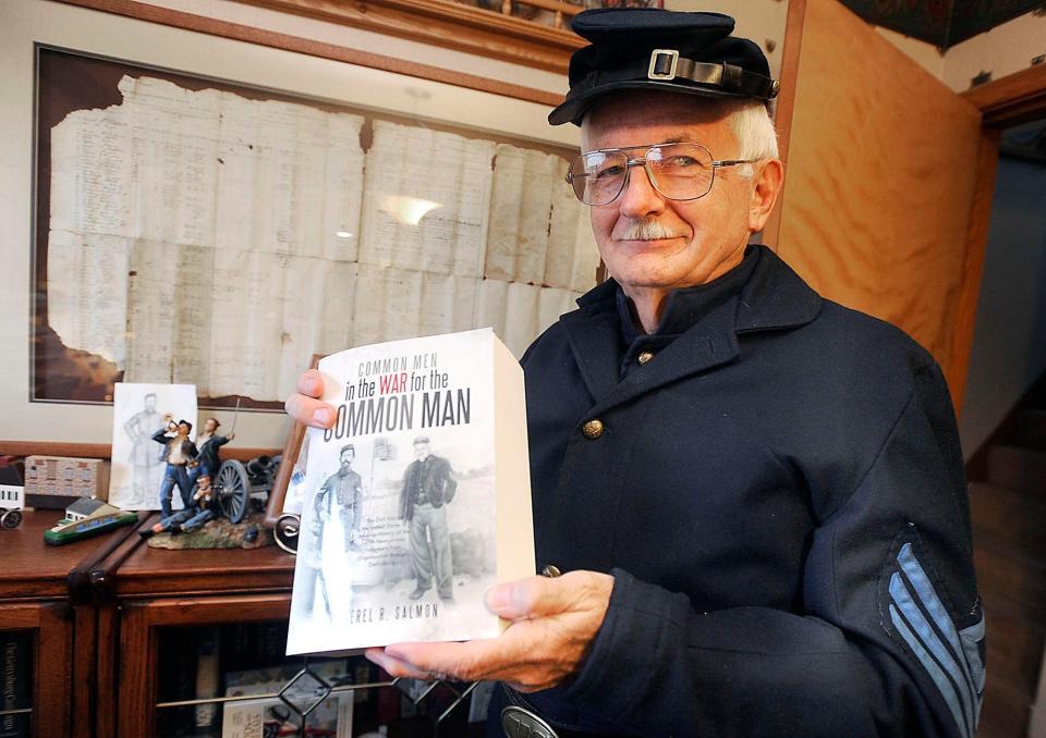 Erie County author Verel Salmon is shown in 2013 with his first book titled "Common Men in the War for the Common Man." That 800-page book on the Civil War chronicled Erie's 145th Regiment. Salmon has written a second book on the 145th.