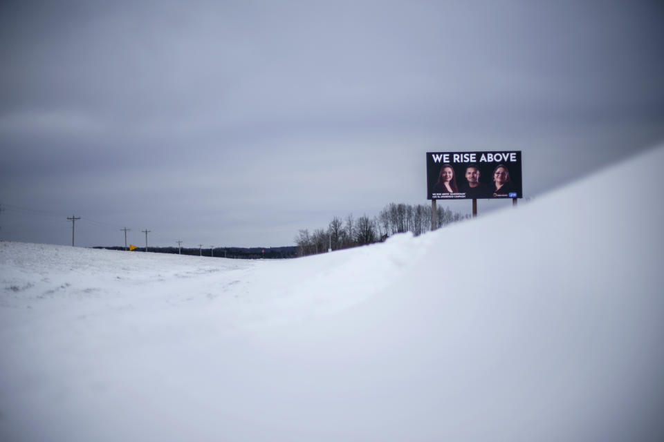 A billboard, part of an awareness campaign to combat prescription opioid abuse in the Native community, stands along a road on the White Earth reservation in Naytahwaush, Minn., Thursday, Nov. 18, 2021. One of the most urgent questions Native American communities are facing is how to spare the next generations from starting the cycle anew. The national average for health care spending is around $11,000 per person, but tribal health systems receive about a third of that and urban Indian groups even less, according to the National Council of Urban Indian Health. COVID added another blow to this already stressed system. (AP Photo/David Goldman)