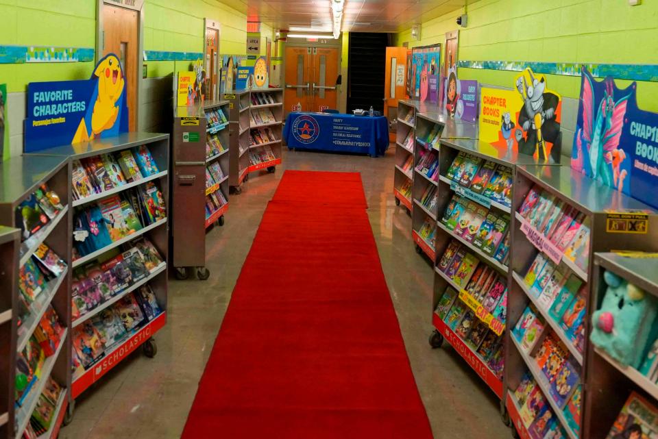 A Scholastic Book Fair, hosted Milwaukee Bucks players Brook and Robin Lopez, is held Wednesday at Auer Avenue Elementary School in Milwaukee.