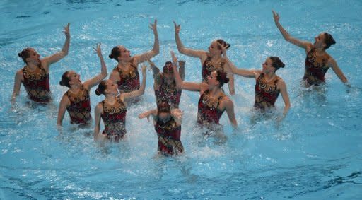 Rusia ganó este sábado el oro en la prueba de rutina libre combinada por equipos de natación sincronizada del Mundial de Barcelona-2013, con lo que logró el pleno de títulos en las siete disciplinas de la especialidad, mientras que España fue plata. (AFP | Pierre-Philippe Marcou)