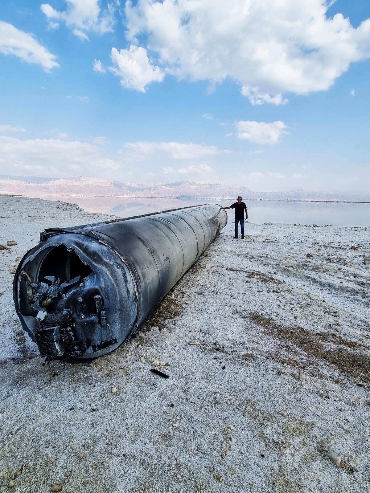 A ballistic missile lies on the shore of the Dead Sea after Iran launched drones and missiles towards Israel (REUTERS)