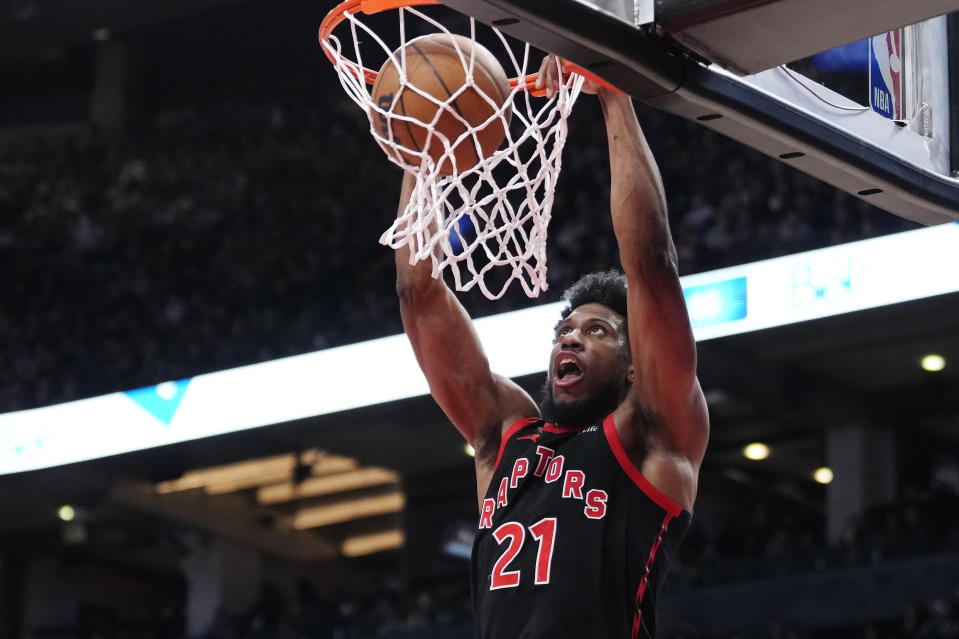 Toronto Raptors forward Thaddeus Young dunks against the Phoenix Suns during second-half NBA basketball game action in Toronto, Friday, Dec. 30, 2022. (Frank Gunn/The Canadian Press via AP)