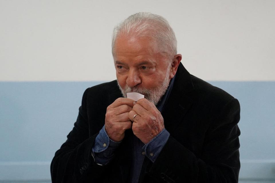 Luiz Inacio Lula da Silva votes at a polling station during the presidential election (Mariana Greif/Reuters)