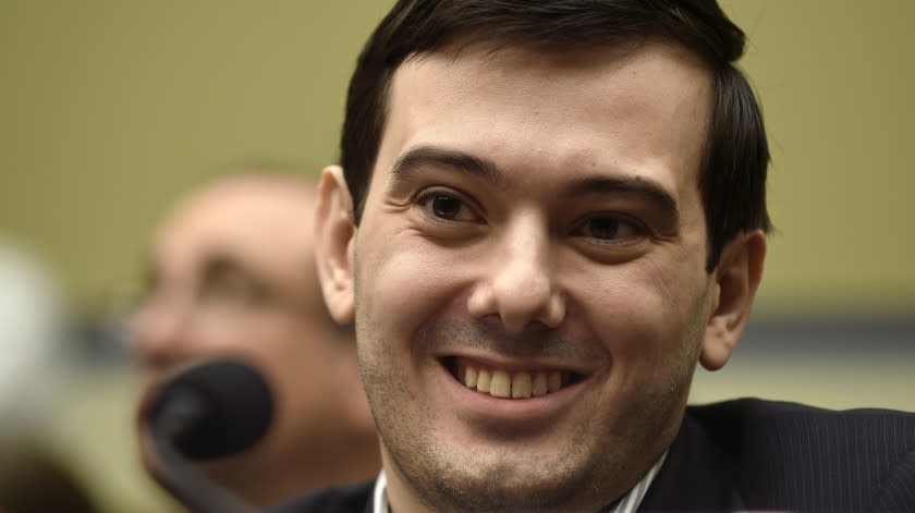 Pharma exec Martin Shkreli smiles on Capitol Hill during a 2016 hearing before the House Committee on Oversight and Reform