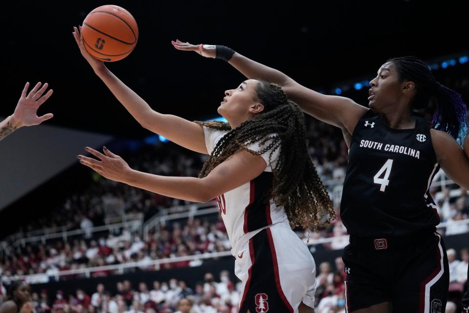 Stanford guard Haley Jones, left, shoots while defended by South Carolina forward Aliyah Boston (4) during the second half of an NCAA college basketball game in Stanford, Calif., Sunday, Nov. 20, 2022. (AP Photo/Godofredo A. VÃ¡squez)