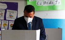 Macedonian Former Prime Minister and leader of the ruling SDSM party Zoran Zaev prepares to cast his ballot at a polling station during the general election, in Strumica
