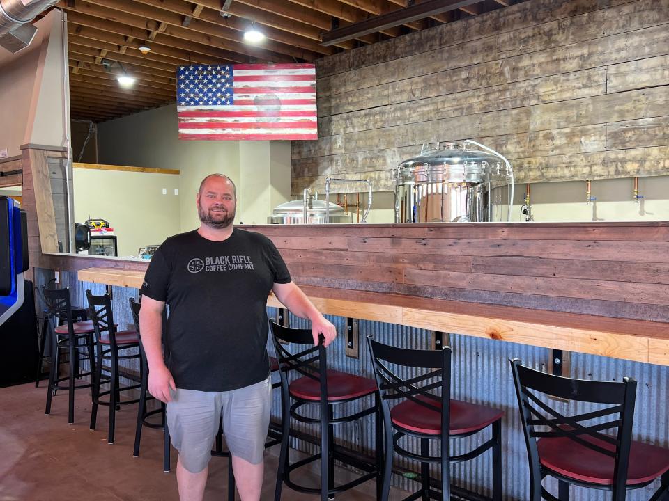 After countless hours of work, Jeb Oehlke (listed) is excited and anxious to finally open Black Paws Brewing Co.