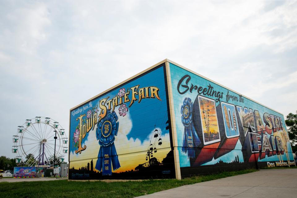 A new mural covers a structure near the Richard O. Jacobsen Exhibition Center on the Iowa State Fairgrounds.