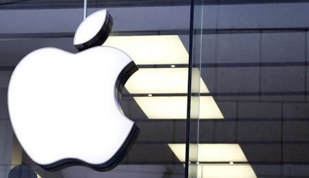 An Apple logo is seen at the Apple store in Munich, Germany, January 27, 2016. REUTERS/Michaela Rehle