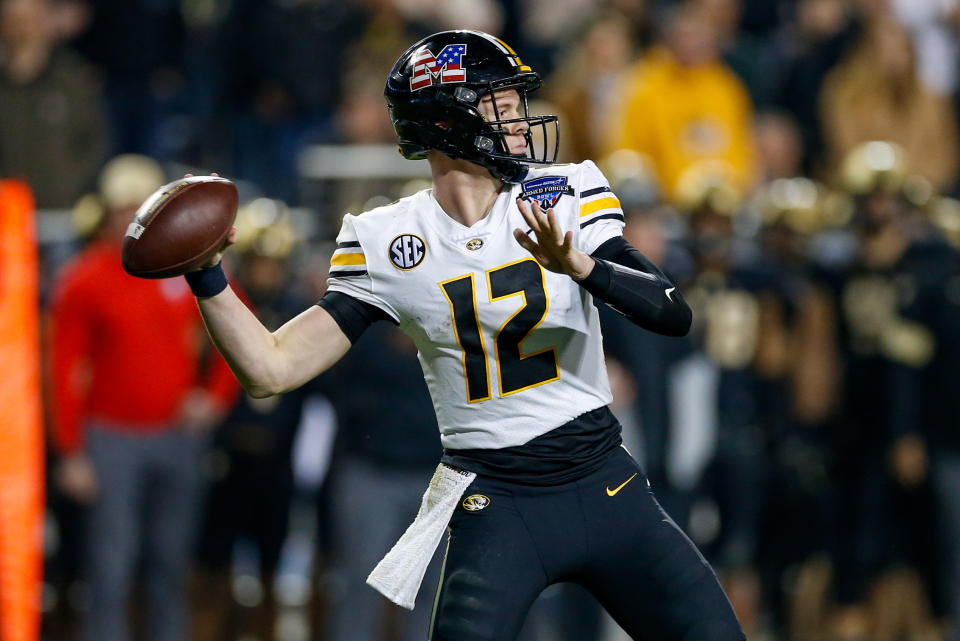 Dec 22, 2021; Fort Worth, Texas, USA; Missouri Tigers quarterback Brady Cook (12) throws a pass during the fourth quarter against the Army Black Knights at the 2021 Armed Forces Bowl at Amon G. Carter Stadium. Mandatory Credit: Andrew Dieb-USA TODAY Sports