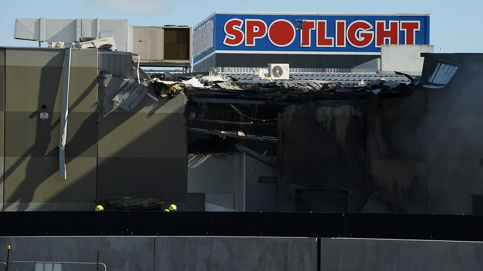 Witnesses said the plane clipped a JB Hi-Fi store before exploding in the adjacent Spotlight venue. Source: AAP