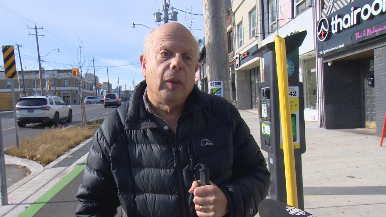 Chair of the Accessibility for Ontarians with Disabilities Act Alliance David Lepofsky says he was shocked to learn from a sighted friend that he was about to wander into a bike lane he could not detect on his own because it was at the same level as the sidewalk. (Paul Smith/CBC - image credit)