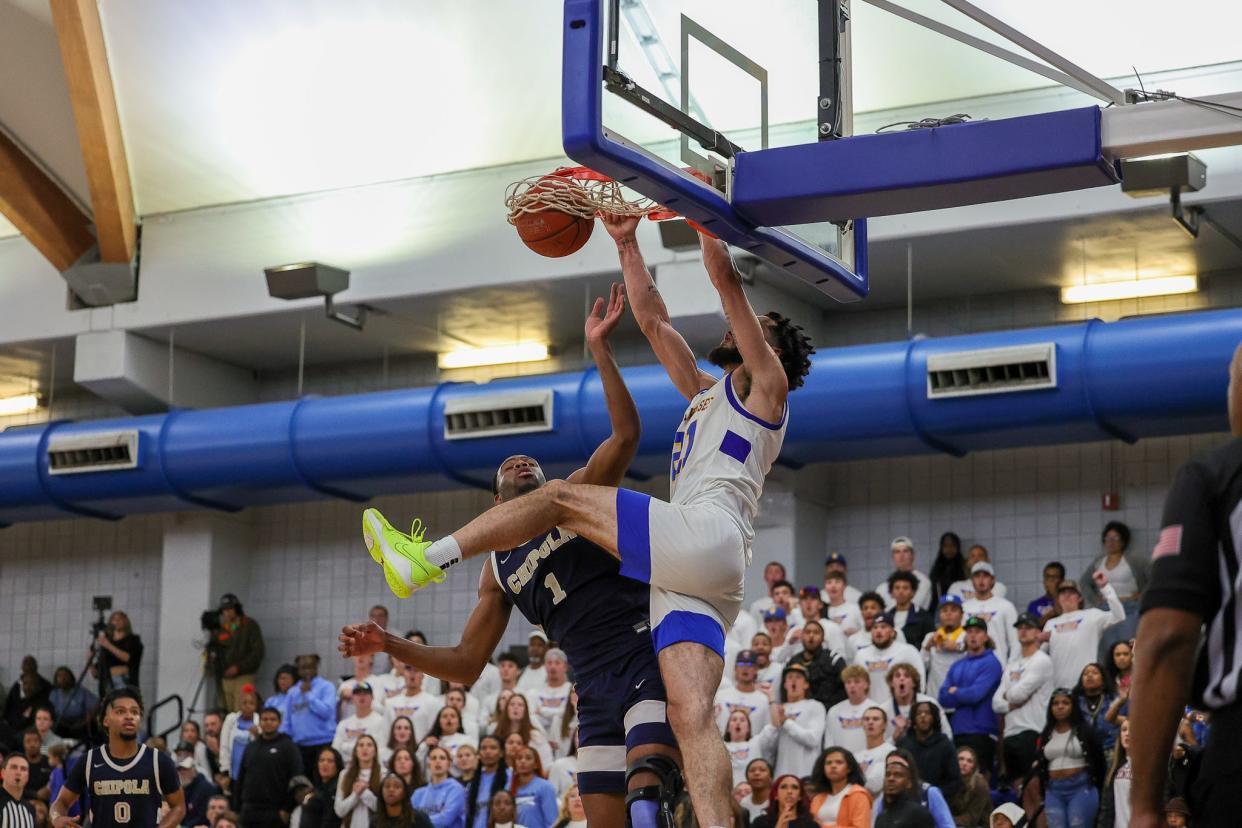 Tallahassee Community College men’s basketball Addison Patterson (right) finishes an alley-oop attempt against Chipola College at Bill Hebrock Eagledome, Tallahassee, Florida, Saturday, Jan. 21, 2023, Tallahassee, Florida