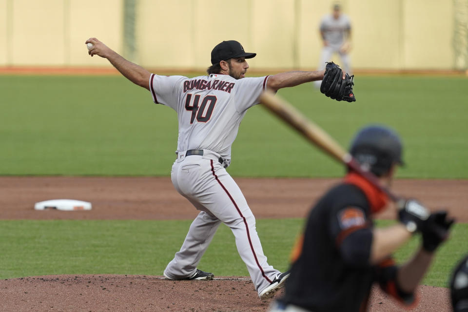 Arizona Diamondbacks starting pitcher Madison Bumgarner throws to San Francisco Giants' Austin Slater during the first inning of a baseball game Saturday, Sept. 5, 2020, in San Francisco. (AP Photo/Eric Risberg)