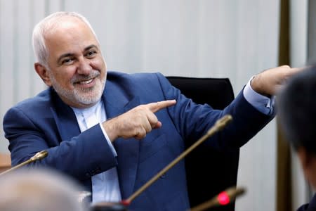 Iranian Foreign Minister Mohammad Javad Zarif gestures at "Common Security in the Islamic World" forum in Kuala Lumpur