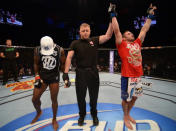 Jamie Varner (right) reacts to being declared the winner over Melvin Guillard (left) after their lightweight fight at UFC 155 on December 29, 2012 at MGM Grand Garden Arena in Las Vegas, Nevada. (Photo by Donald Miralle/Zuffa LLC/Zuffa LLC via Getty Images)