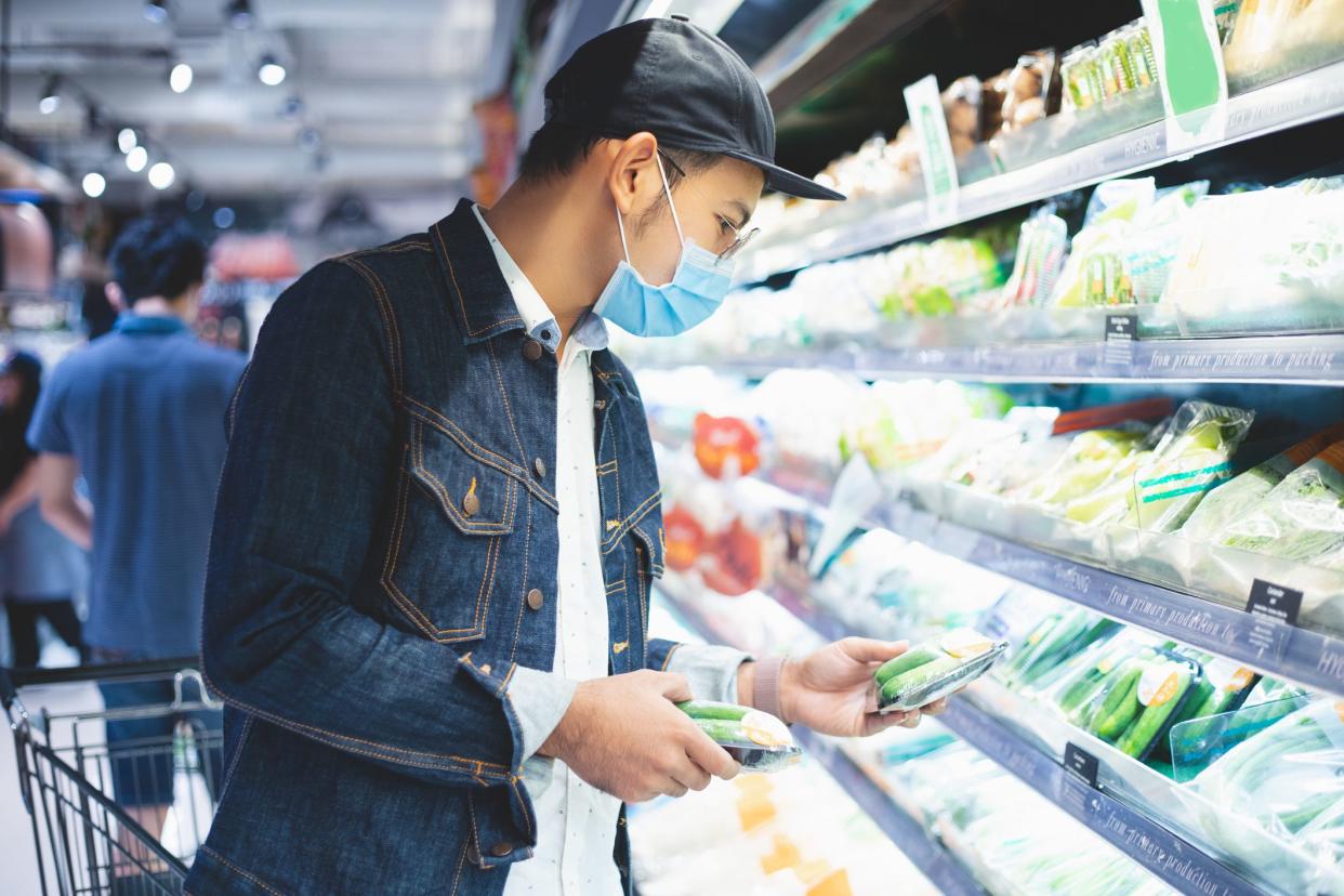 Man shopping in a food store.