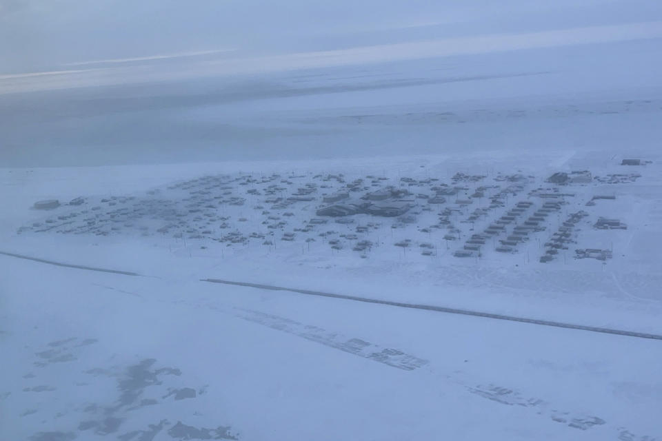 An aerial view shows the northwest Alaska village of Point Hope on the Chukchi Sea, on Sunday, Feb. 25, 2024. A fatal shooting at a home in a remote Inupiat whaling village on Alaska's northwest coast on Sunday, Feb. 25, 2024, shook the small community in Point Hope. (Ka'ainoa Ravey via AP)