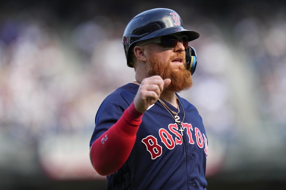 Boston Red Sox's Justin Turner gestures to teammates during the ninth inning of a baseball game against the New York Yankees, Sunday, Aug. 20, 2023, in New York. The Red Sox won 6-5. (AP Photo/Frank Franklin II)