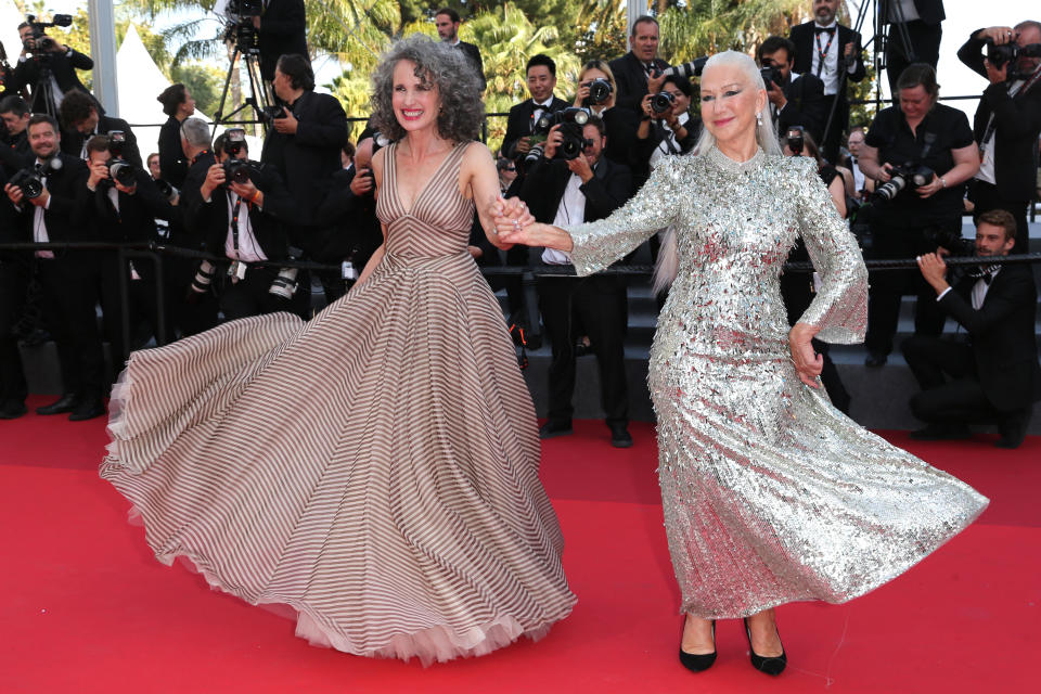 Andie MacDowell and Helen Mirren dance together on the red carpet at Cannes film festival 