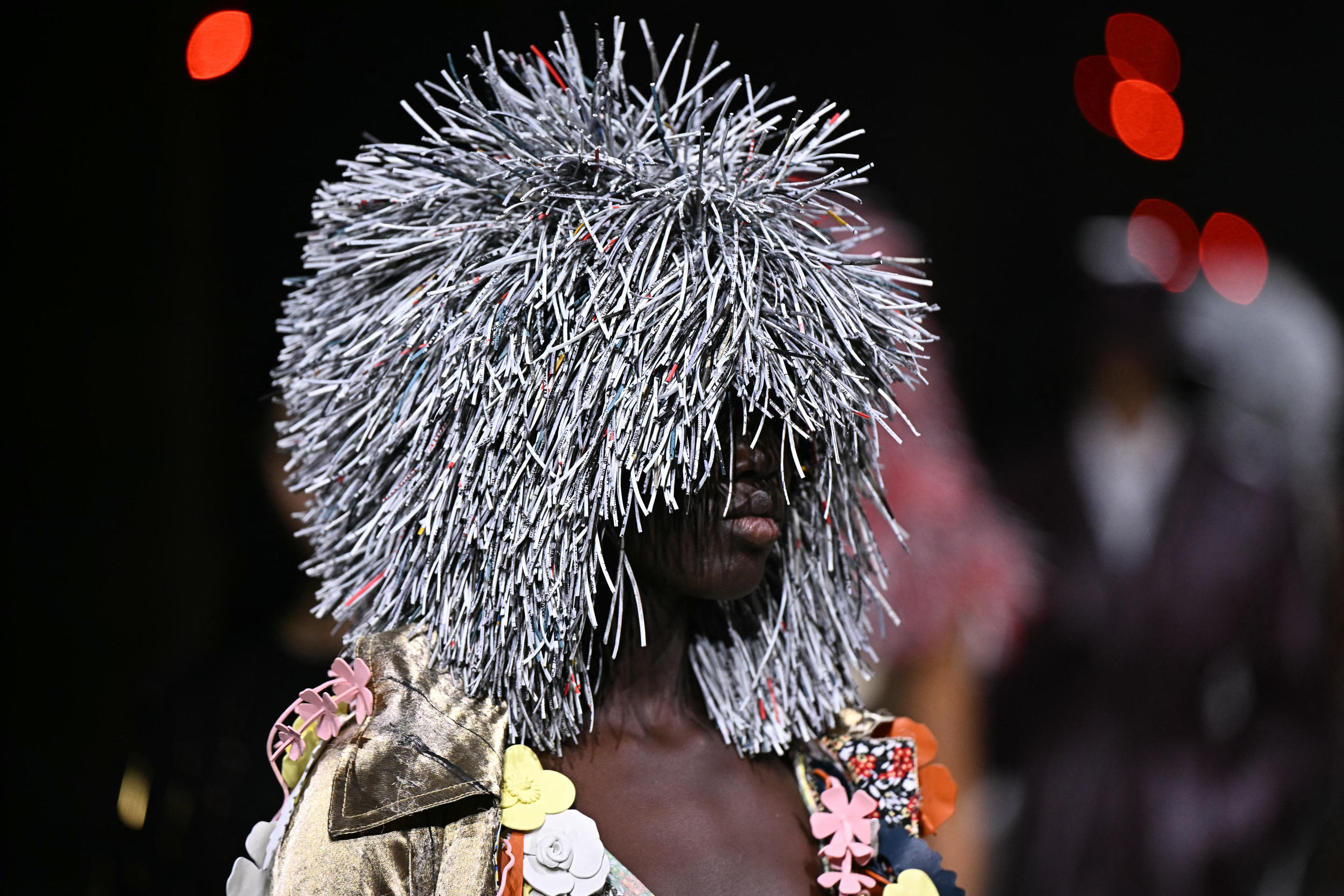 Bottega Veneta headgear on display. 