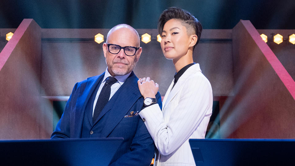 Alton Brown and Kristen Kish host “Iron Chef” on Netflix. - Credit: PATRICK WYMORE/NETFLIX