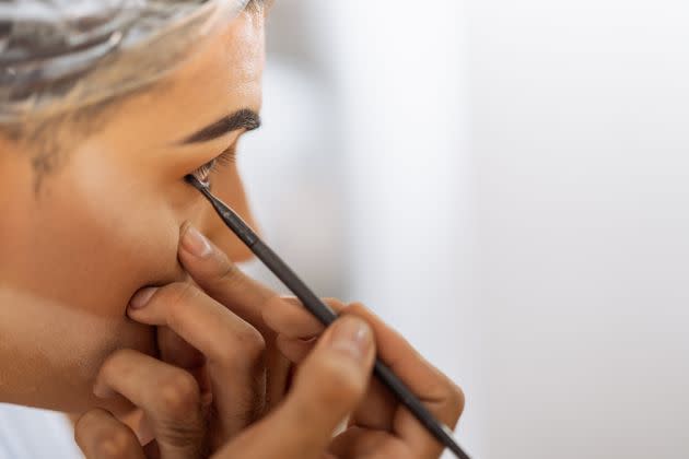 Black eyeliner can look harsh on eyes that are losing definition.